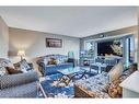 164 Martinwood Way Ne, Calgary, AB  - Indoor Photo Showing Living Room 