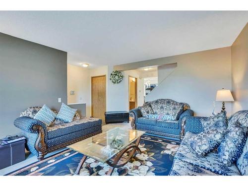 164 Martinwood Way Ne, Calgary, AB - Indoor Photo Showing Living Room