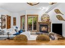 107-155 Crossbow Place, Canmore, AB  - Indoor Photo Showing Living Room With Fireplace 