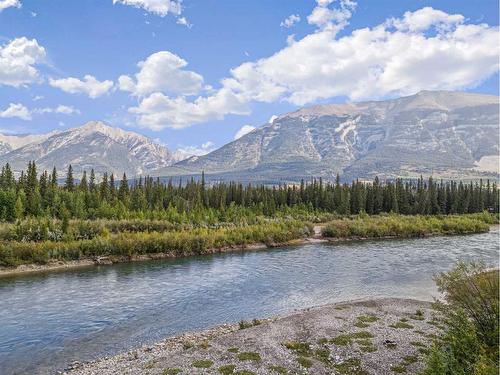 107-155 Crossbow Place, Canmore, AB - Outdoor With Body Of Water With View