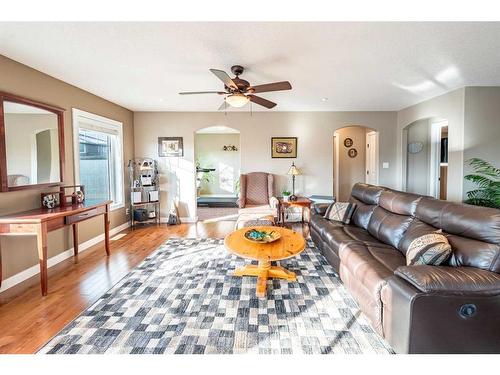 520 Harrison Court, Crossfield, AB - Indoor Photo Showing Living Room