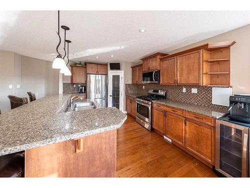 520 Harrison Court, Crossfield, AB - Indoor Photo Showing Kitchen With Stainless Steel Kitchen With Double Sink