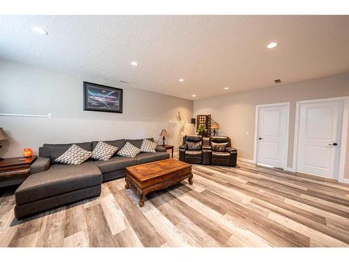 520 Harrison Court, Crossfield, AB - Indoor Photo Showing Living Room