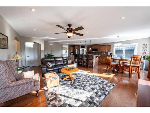 520 Harrison Court, Crossfield, AB - Indoor Photo Showing Living Room