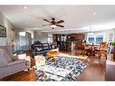 520 Harrison Court, Crossfield, AB  - Indoor Photo Showing Living Room 