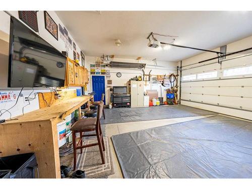 520 Harrison Court, Crossfield, AB - Indoor Photo Showing Garage