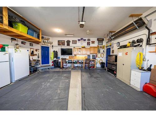 520 Harrison Court, Crossfield, AB - Indoor Photo Showing Garage