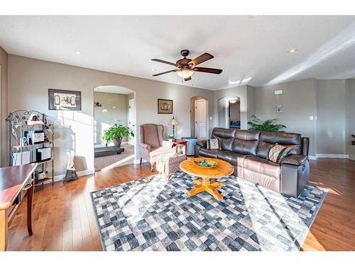 520 Harrison Court, Crossfield, AB - Indoor Photo Showing Living Room