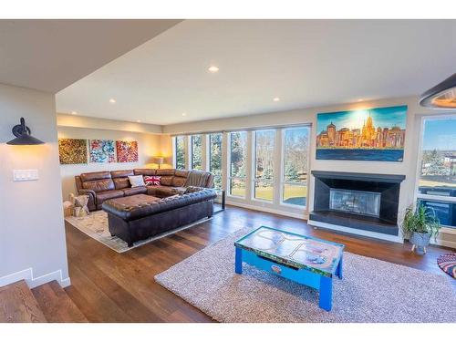 15 Elbow River Circle, Rural Rocky View County, AB - Indoor Photo Showing Living Room With Fireplace