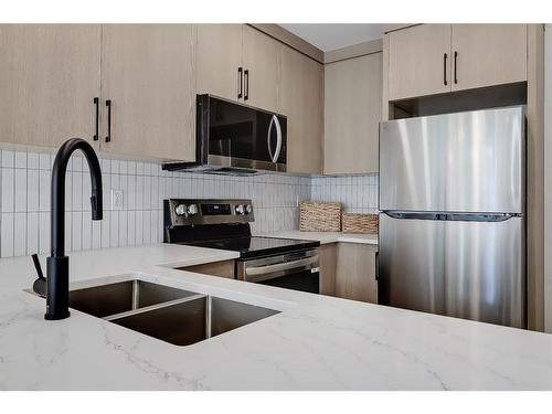 2528 4 Avenue Nw, Calgary, AB - Indoor Photo Showing Kitchen With Stainless Steel Kitchen With Double Sink With Upgraded Kitchen