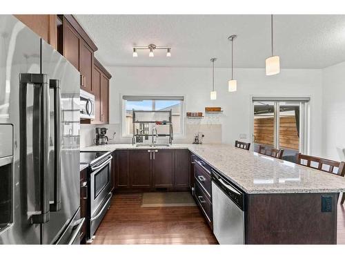 221 Hillcrest Road, Airdrie, AB - Indoor Photo Showing Kitchen With Upgraded Kitchen