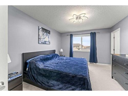 221 Hillcrest Road, Airdrie, AB - Indoor Photo Showing Bedroom