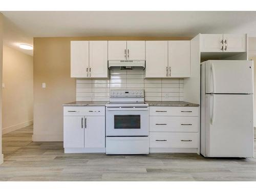 204 Windsor Avenue, Diamond Valley, AB - Indoor Photo Showing Kitchen