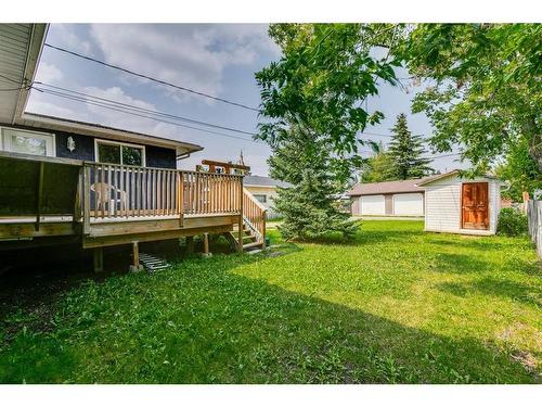 204 Windsor Avenue, Diamond Valley, AB - Outdoor With Deck Patio Veranda