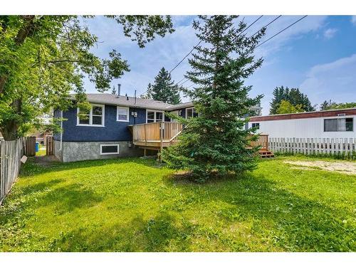 204 Windsor Avenue, Diamond Valley, AB - Outdoor With Deck Patio Veranda