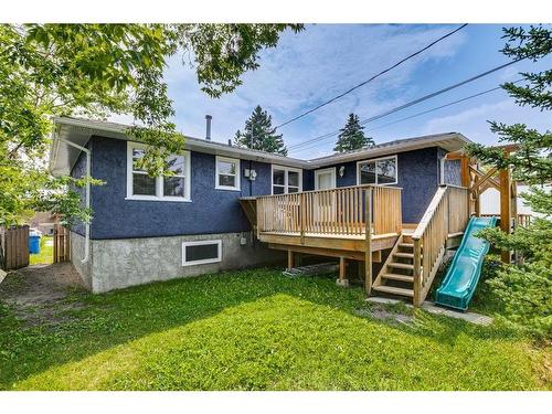 204 Windsor Avenue, Diamond Valley, AB - Outdoor With Deck Patio Veranda