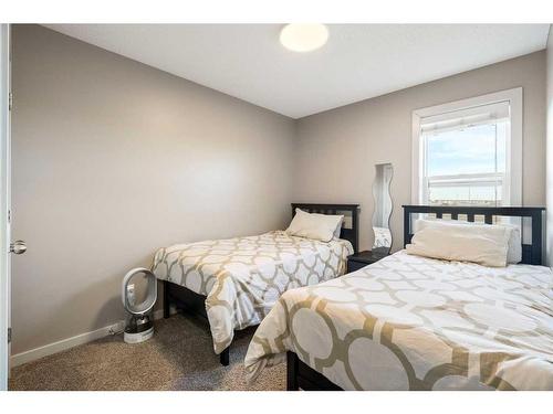 248 Marquis Heights Se, Calgary, AB - Indoor Photo Showing Bedroom