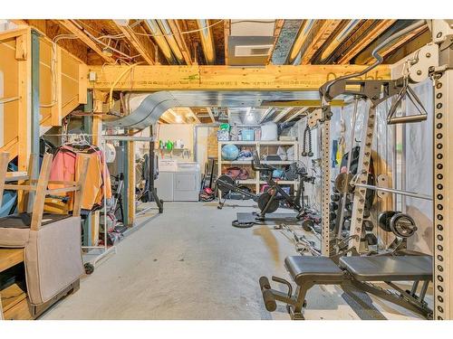 82 Auburn Crest Place Se, Calgary, AB - Indoor Photo Showing Gym Room