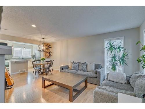 82 Auburn Crest Place Se, Calgary, AB - Indoor Photo Showing Living Room