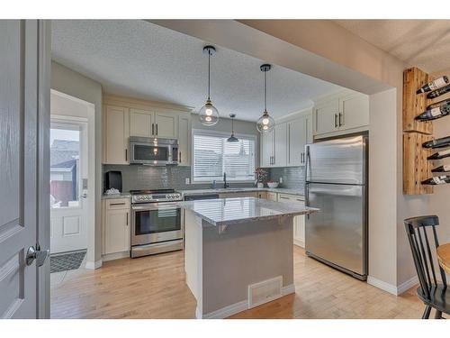 82 Auburn Crest Place Se, Calgary, AB - Indoor Photo Showing Kitchen With Stainless Steel Kitchen With Upgraded Kitchen