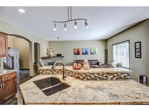 57 Eversyde Manor Sw, Calgary, AB - Indoor Photo Showing Kitchen With Double Sink