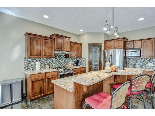 57 Eversyde Manor Sw, Calgary, AB - Indoor Photo Showing Kitchen With Stainless Steel Kitchen With Double Sink With Upgraded Kitchen