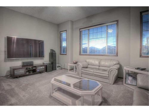 57 Eversyde Manor Sw, Calgary, AB - Indoor Photo Showing Living Room