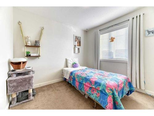 11 Bridlecrest Place Sw, Calgary, AB - Indoor Photo Showing Bedroom