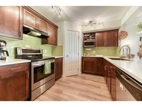 11 Bridlecrest Place Sw, Calgary, AB - Indoor Photo Showing Kitchen