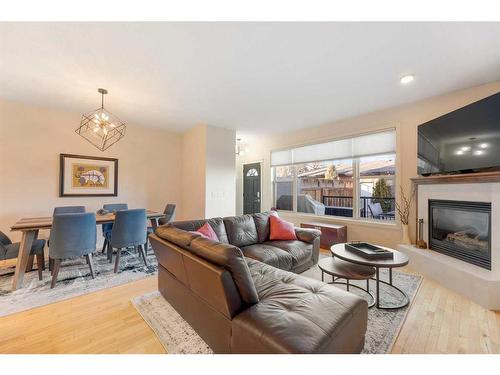 140 41 Avenue Nw, Calgary, AB - Indoor Photo Showing Living Room With Fireplace