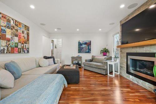 404 129 Avenue Se, Calgary, AB - Indoor Photo Showing Living Room With Fireplace