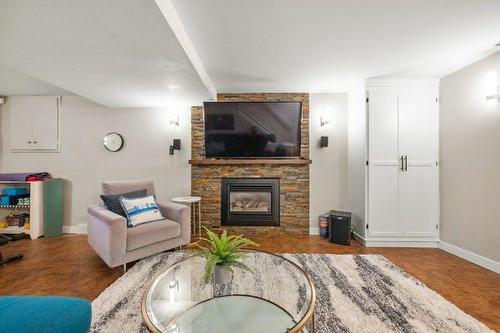 404 129 Avenue Se, Calgary, AB - Indoor Photo Showing Living Room With Fireplace