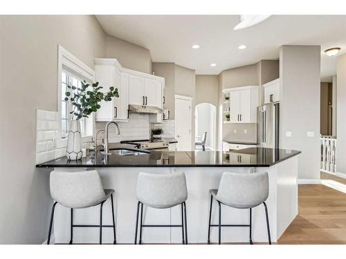 2 Simcrest Grove Sw, Calgary, AB - Indoor Photo Showing Kitchen With Stainless Steel Kitchen With Double Sink With Upgraded Kitchen