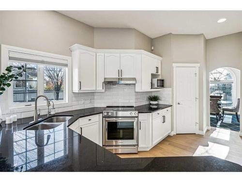 2 Simcrest Grove Sw, Calgary, AB - Indoor Photo Showing Kitchen With Double Sink With Upgraded Kitchen