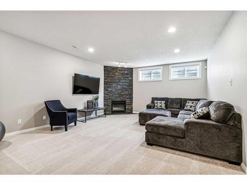 2 Simcrest Grove Sw, Calgary, AB - Indoor With Fireplace