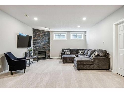 2 Simcrest Grove Sw, Calgary, AB - Indoor With Fireplace