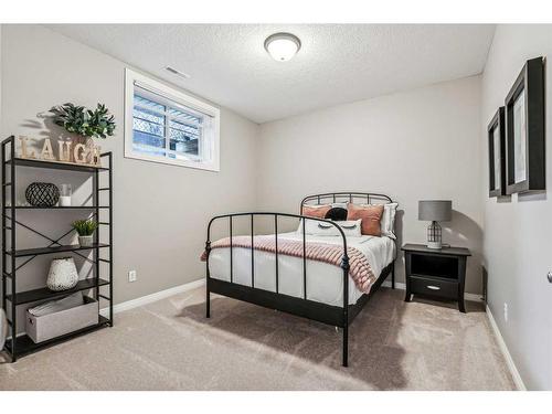 2 Simcrest Grove Sw, Calgary, AB - Indoor Photo Showing Bedroom