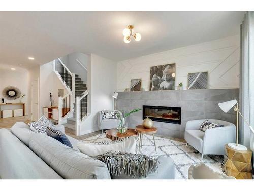 170 Saddlebred Place, Cochrane, AB - Indoor Photo Showing Living Room With Fireplace