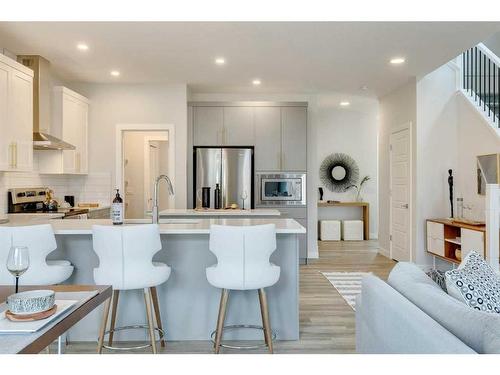 170 Saddlebred Place, Cochrane, AB - Indoor Photo Showing Kitchen With Stainless Steel Kitchen With Upgraded Kitchen