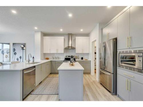 170 Saddlebred Place, Cochrane, AB - Indoor Photo Showing Kitchen With Stainless Steel Kitchen With Upgraded Kitchen