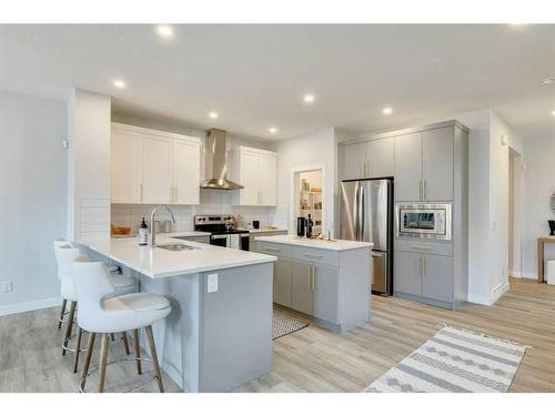 170 Saddlebred Place, Cochrane, AB - Indoor Photo Showing Kitchen With Stainless Steel Kitchen With Upgraded Kitchen