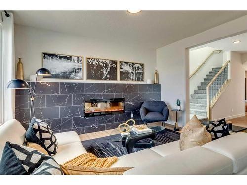 17 Cliff Street, Okotoks, AB - Indoor Photo Showing Living Room With Fireplace