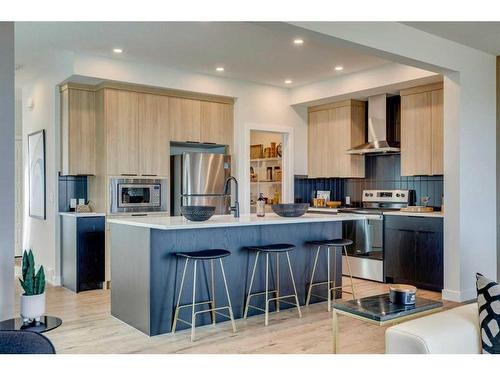 17 Cliff Street, Okotoks, AB - Indoor Photo Showing Kitchen With Stainless Steel Kitchen With Upgraded Kitchen