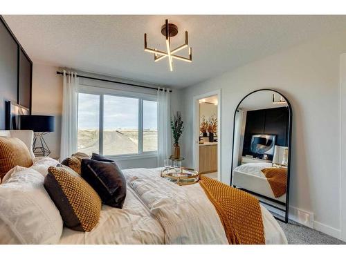 17 Cliff Street, Okotoks, AB - Indoor Photo Showing Bedroom