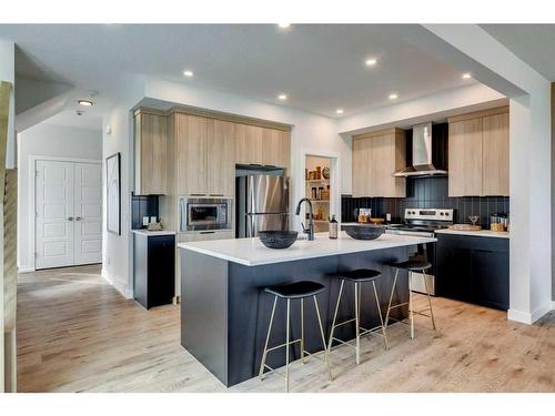 17 Cliff Street, Okotoks, AB - Indoor Photo Showing Kitchen With Stainless Steel Kitchen With Upgraded Kitchen