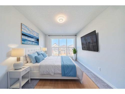 67 Seton Villas Se, Calgary, AB - Indoor Photo Showing Bedroom