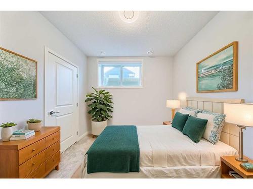 67 Seton Villas Se, Calgary, AB - Indoor Photo Showing Bedroom