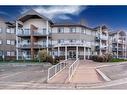 114-92 Saddletree Court Ne, Calgary, AB  - Outdoor With Balcony With Facade 