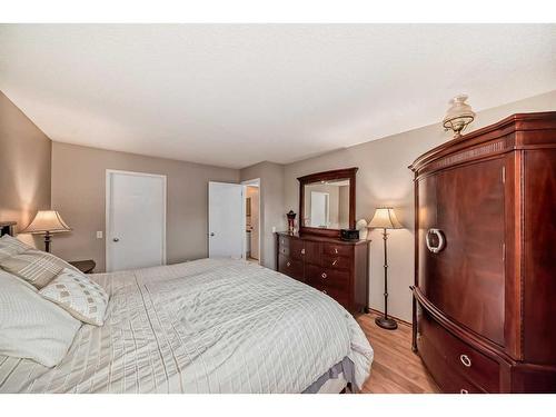 75 River Rock Way Se, Calgary, AB - Indoor Photo Showing Bedroom