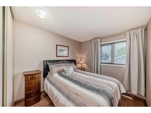 75 River Rock Way Se, Calgary, AB - Indoor Photo Showing Bedroom